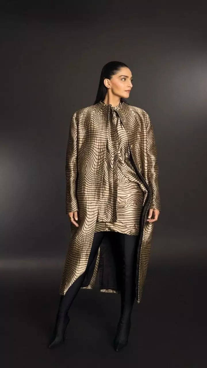 Sonam Kapoor Radiates Power Girl Charm In Golden Mini Dress And Chic Long Jacket 